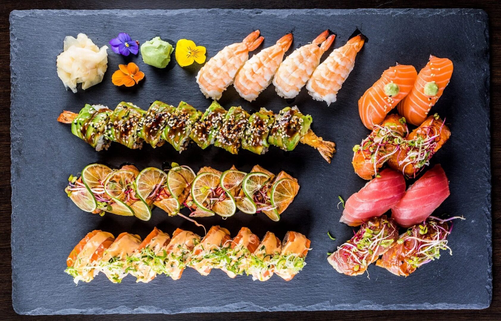Different types of sushi decorated in a plate